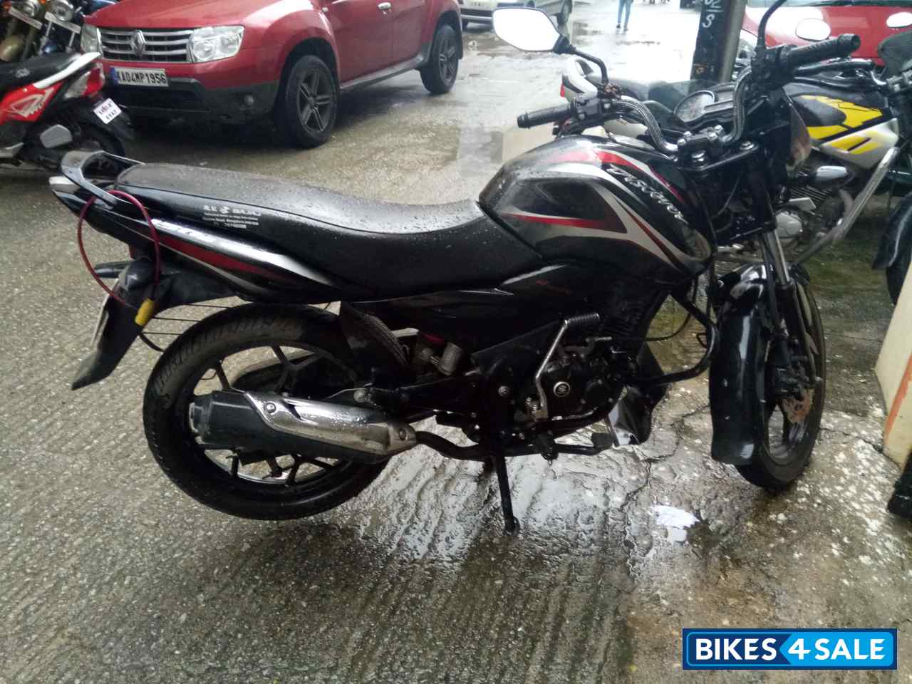 Black Bajaj Discover 150 S