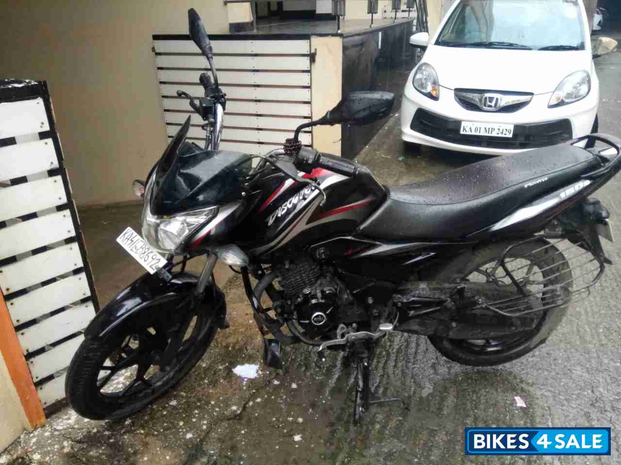 Black Bajaj Discover 150 S