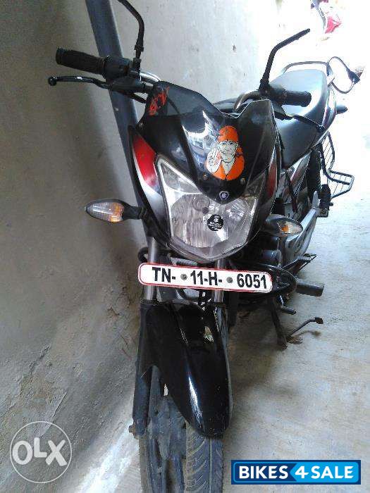 Red-black Bajaj Discover 100M