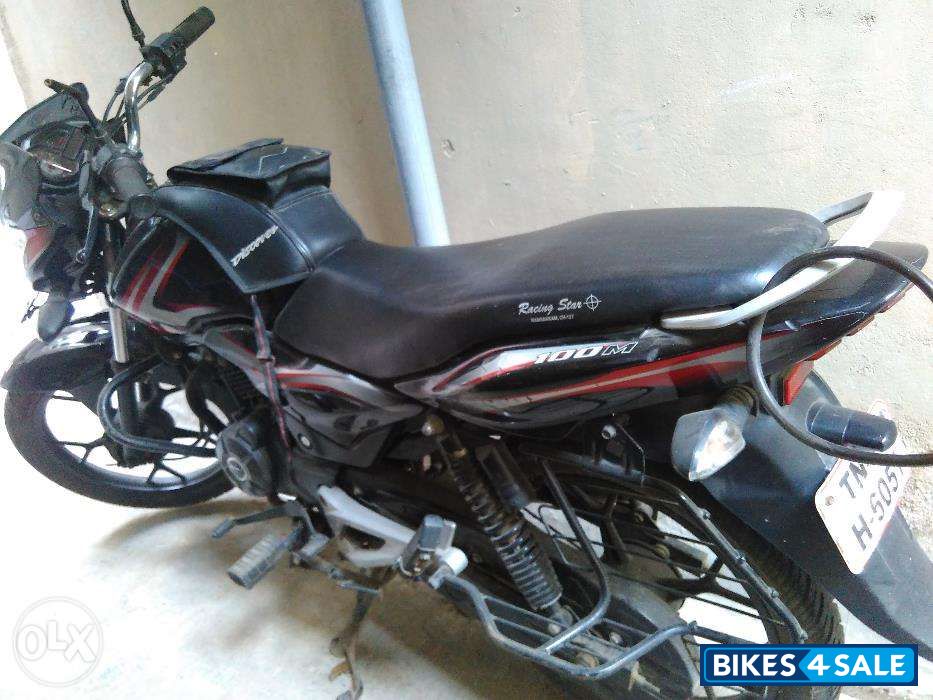 Red-black Bajaj Discover 100M