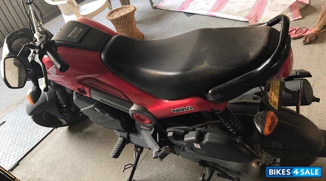 Red And Black Honda Navi