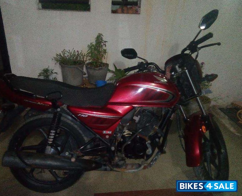 Maroon Honda Dream Neo