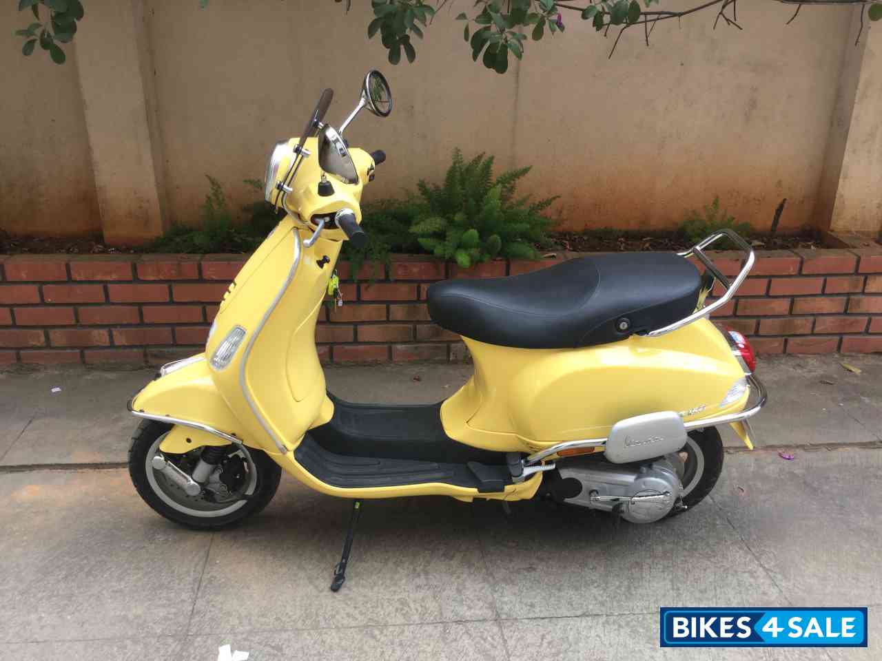 Yellow Vespa VXL 150