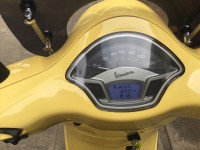 Yellow Vespa VXL 150