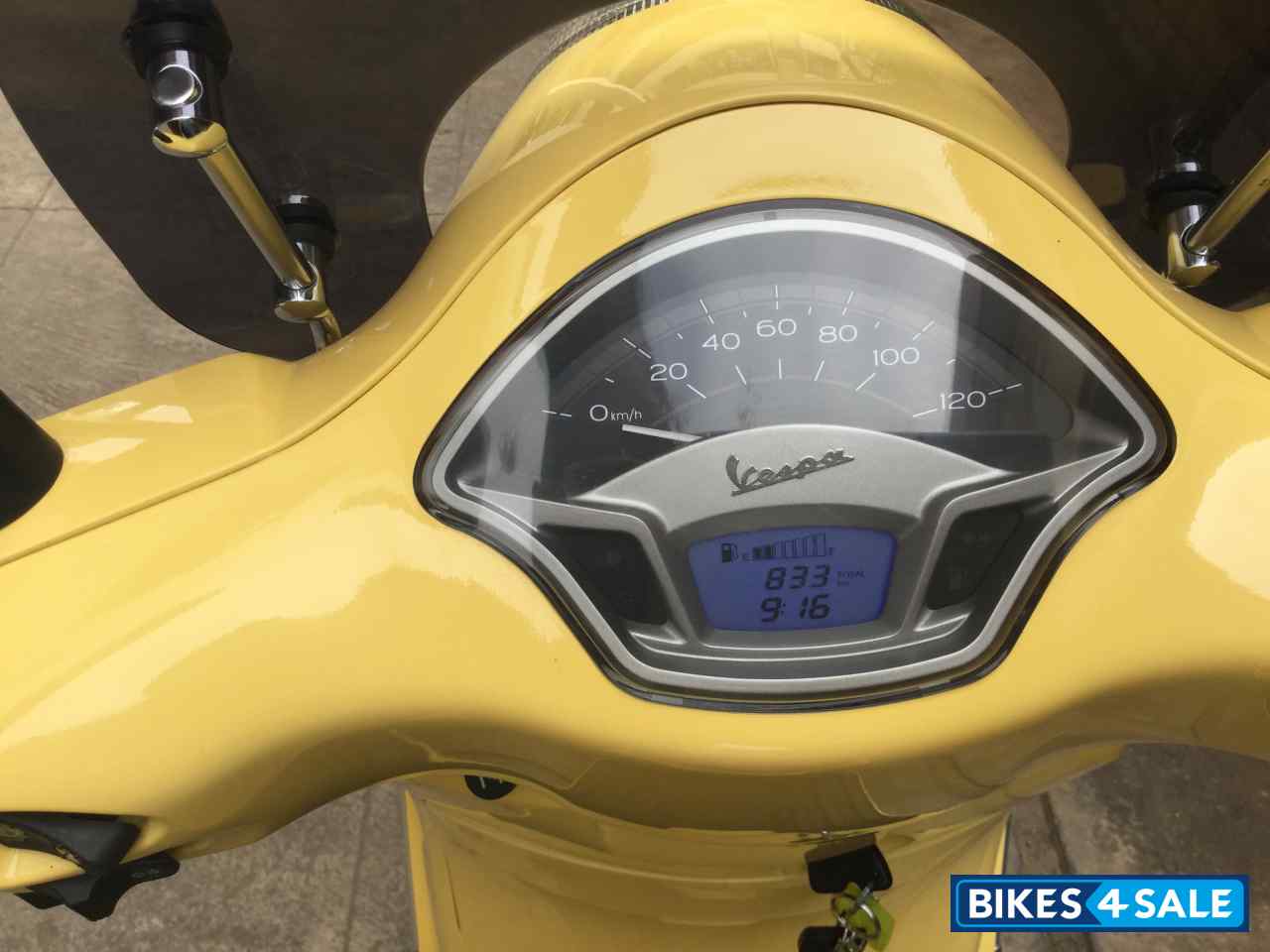 Yellow Vespa VXL 150