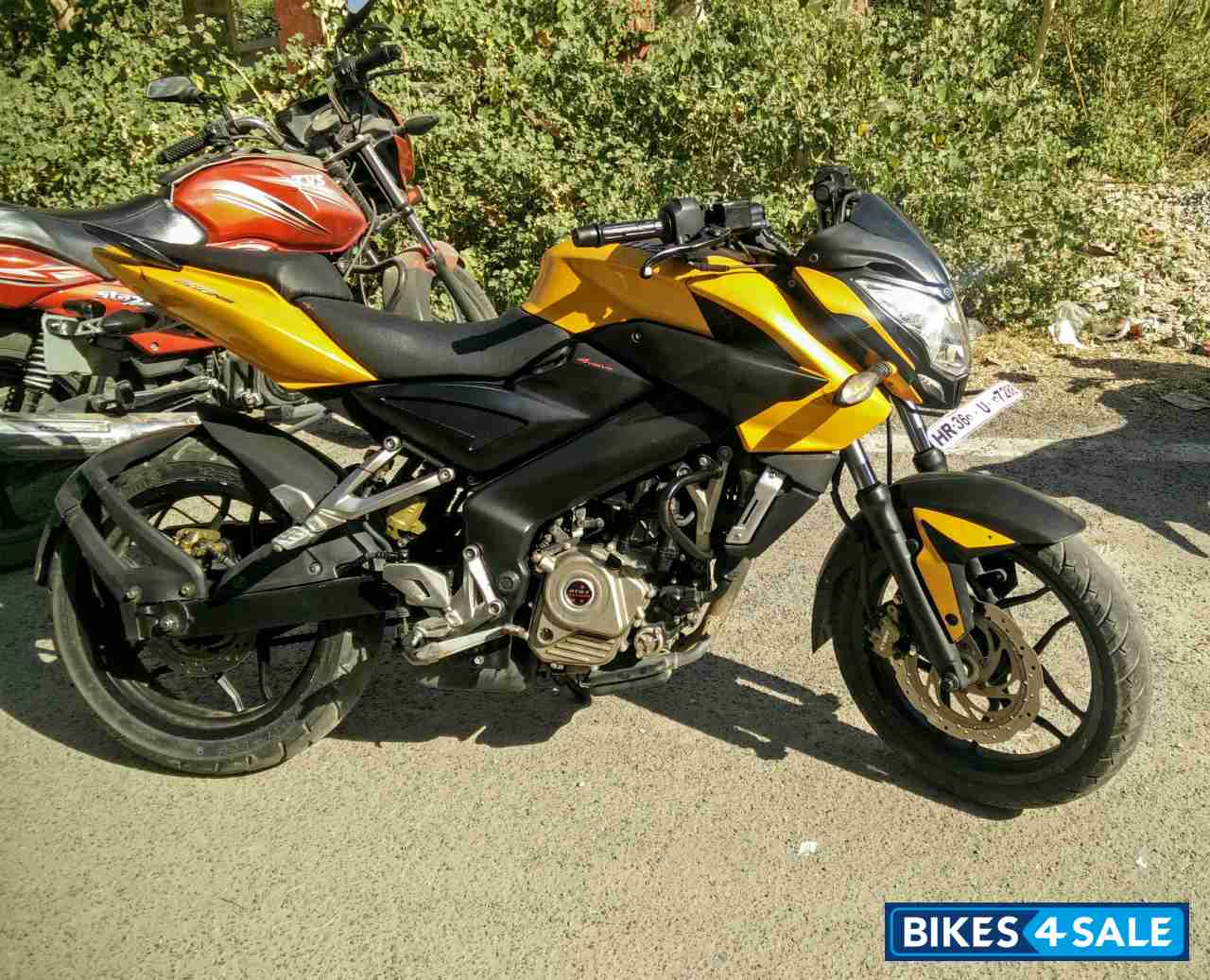 Yellow Bajaj Pulsar 200 NS