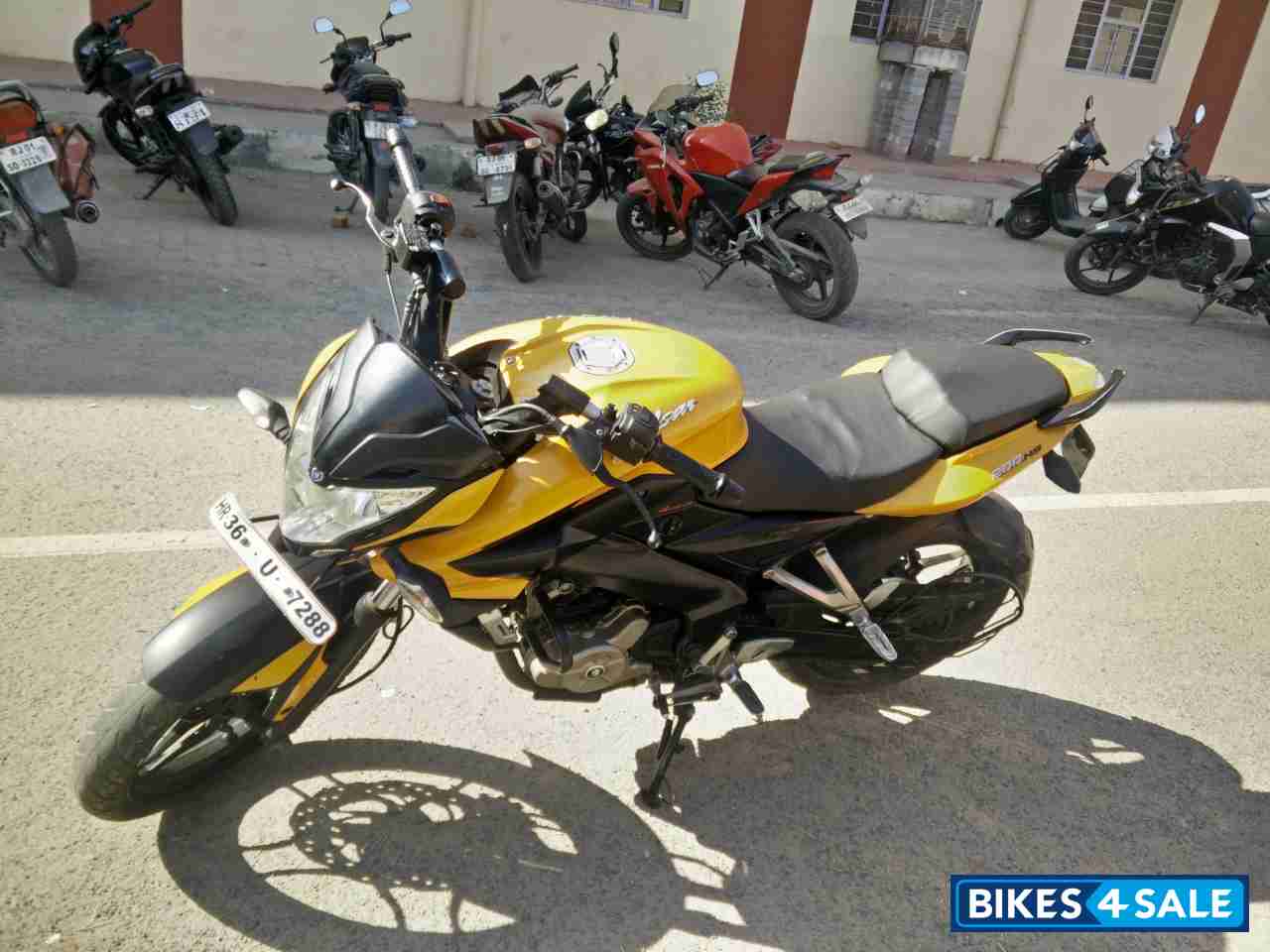 Yellow Bajaj Pulsar 200 NS
