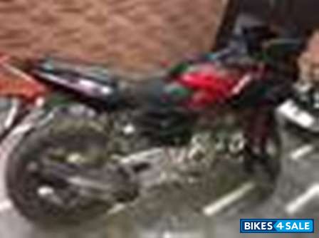 Red Bajaj Pulsar AS 200