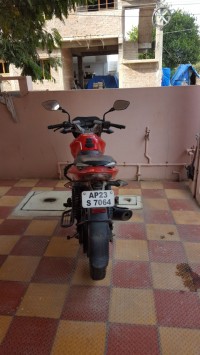 Red Bajaj Pulsar 135LS