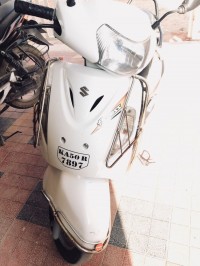 White Suzuki Access 125