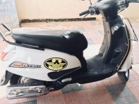 White Suzuki Access 125