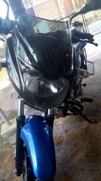 Black-blue Bajaj Pulsar 150 DTSi