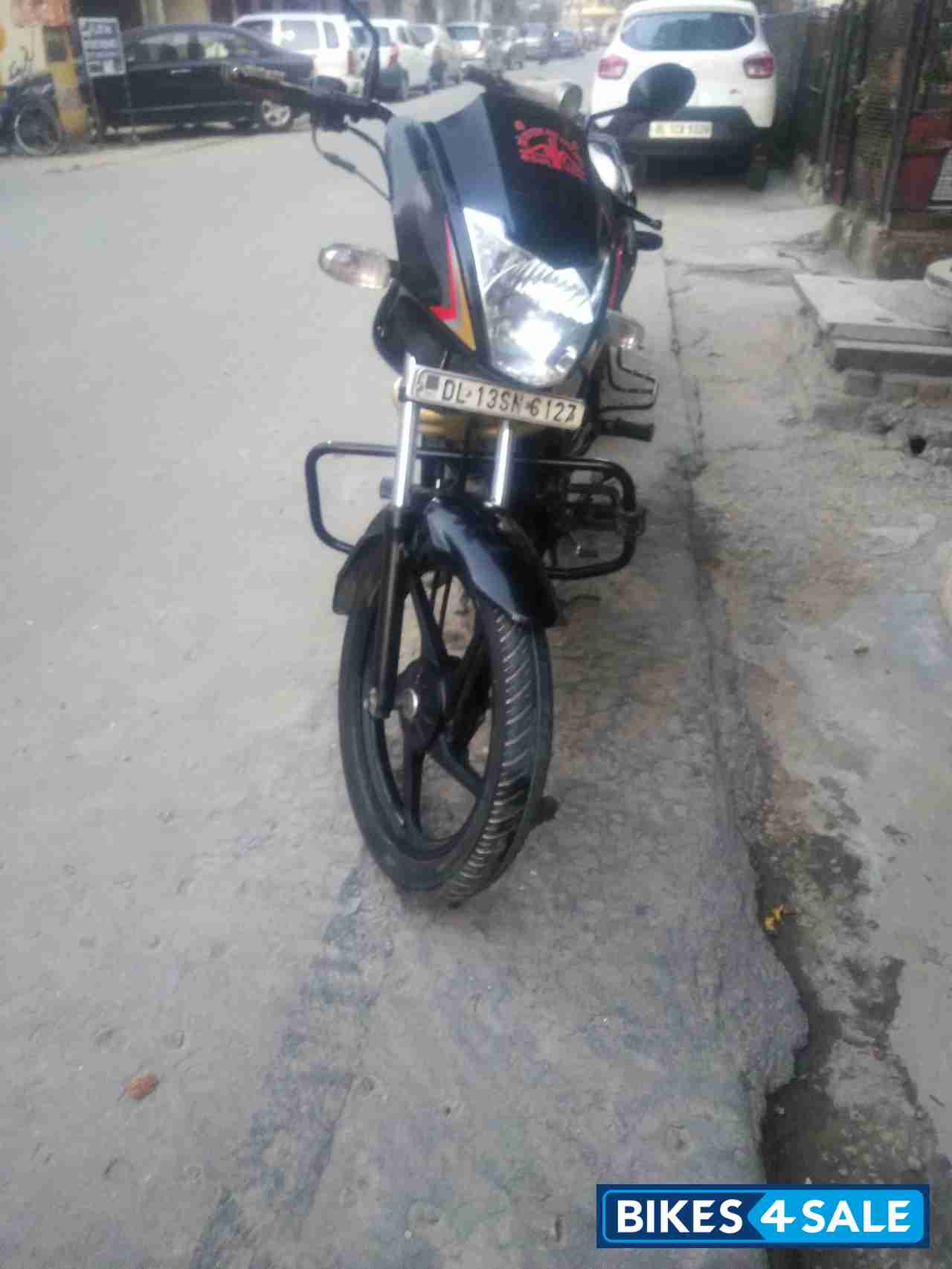 Black Red Mahindra Centuro NXT