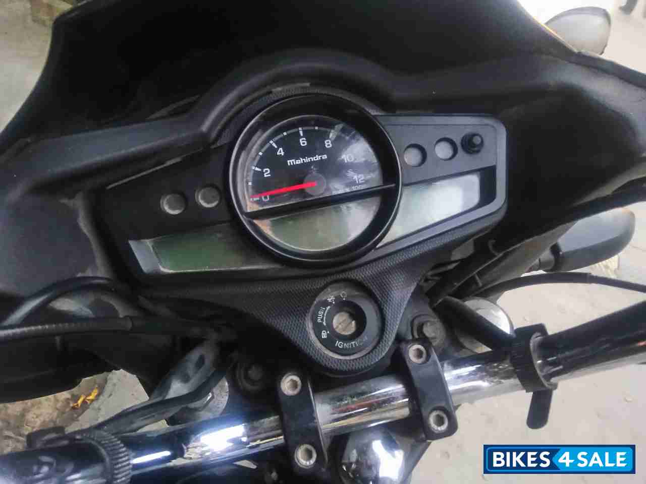 Black Red Mahindra Centuro NXT