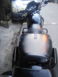 Black Red Mahindra Centuro NXT