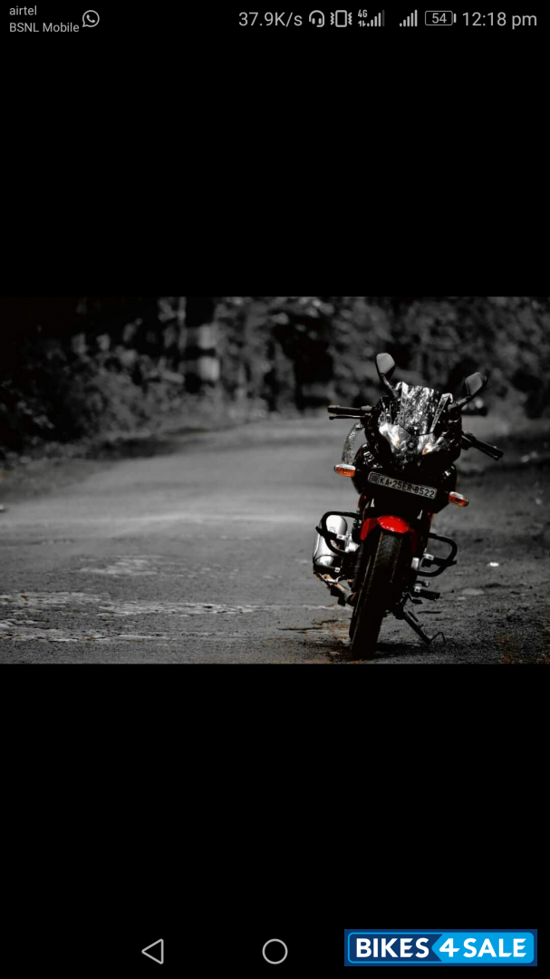 Black-red Bajaj Pulsar 220F
