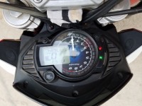 Red And White Mahindra Mojo