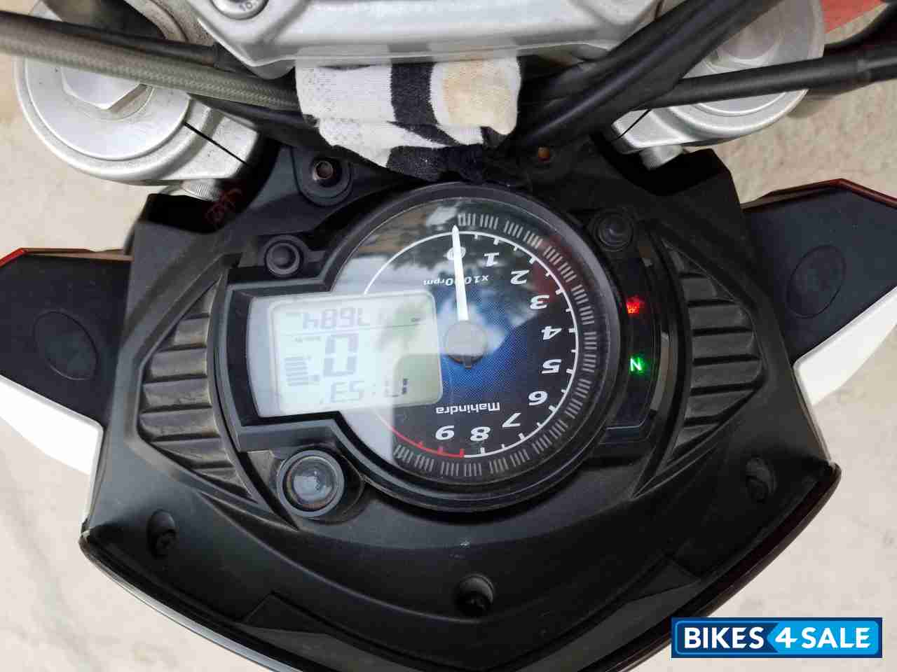 Red And White Mahindra Mojo