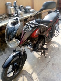 Red And Black Bajaj Discover 125