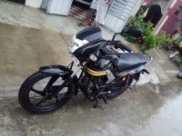 Black With Gold Ribs Mahindra Centuro