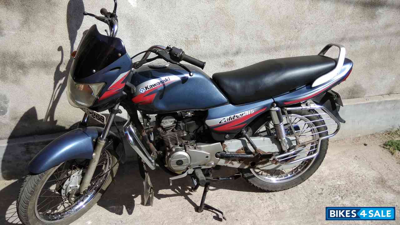 G. M. Blue Bajaj Caliber 115
