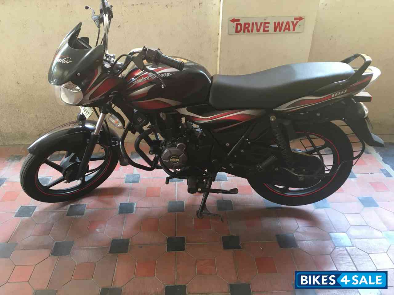 Red And Black Bajaj Discover 100