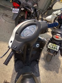 White Suzuki Access 125