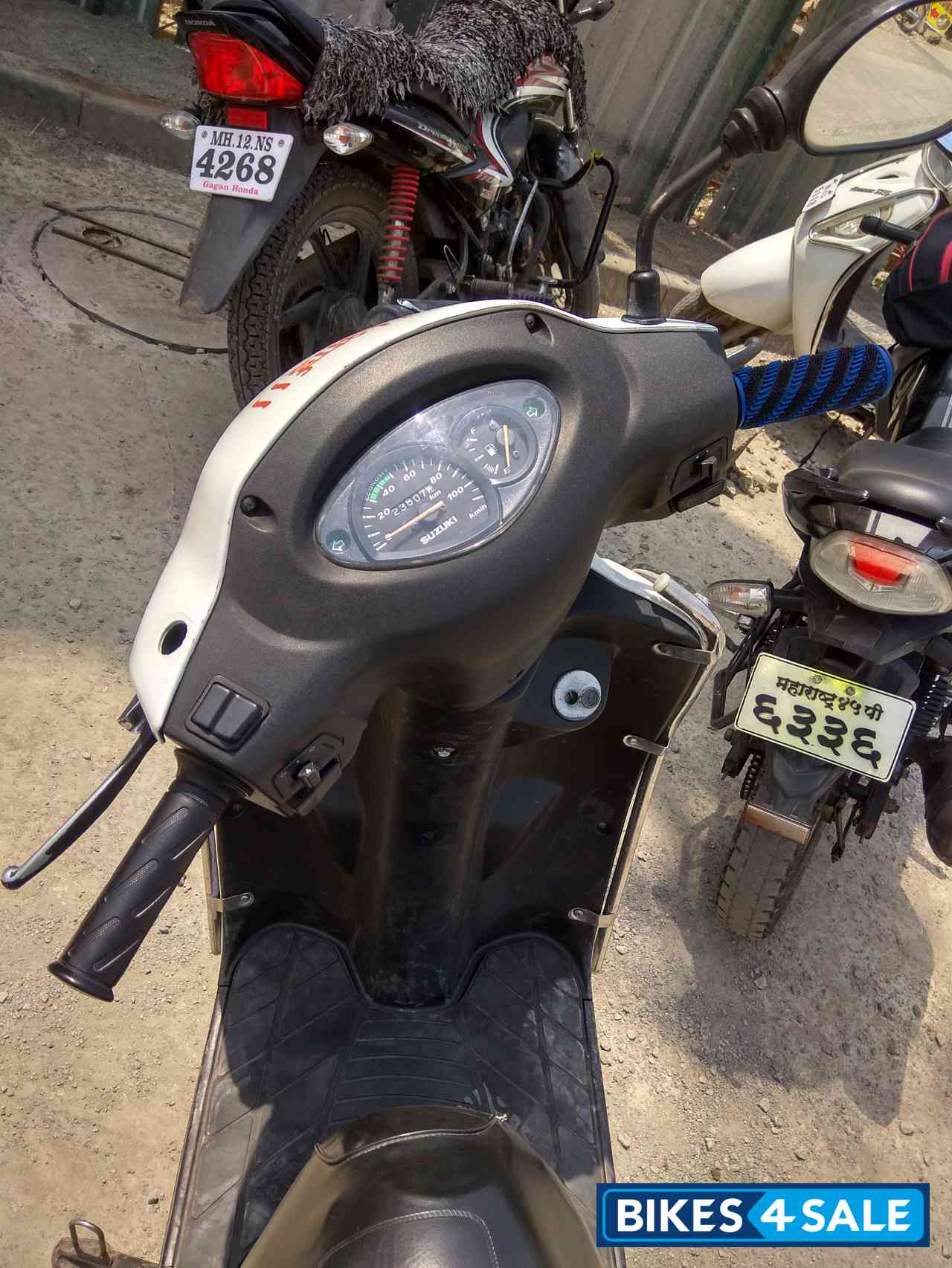 White Suzuki Access 125