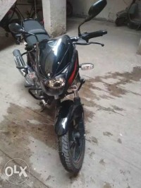 Black And Red Bajaj Pulsar 180 DTSi
