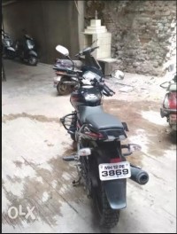 Black And Red Bajaj Pulsar 180 DTSi