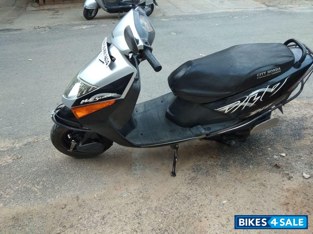 Silver Black Honda Dio