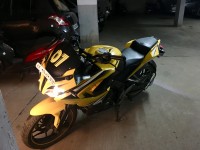 Yellow Bajaj Pulsar RS 200 ABS