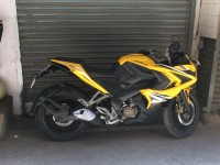 Yellow Bajaj Pulsar RS 200 ABS