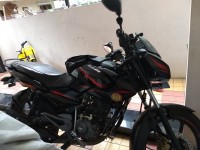 Black With  Red Bajaj Pulsar 135LS