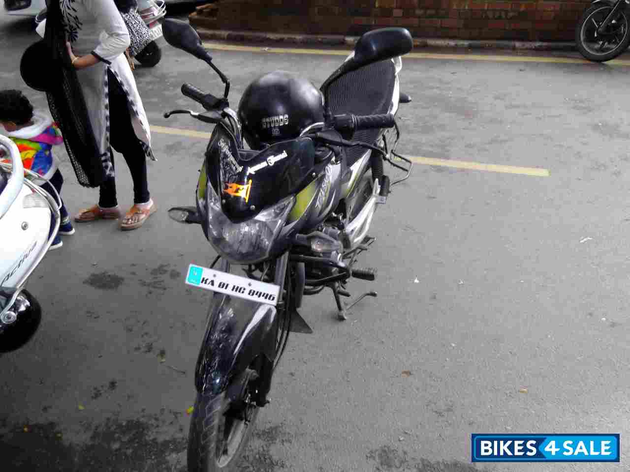 Green & Black Bajaj Discover 100M