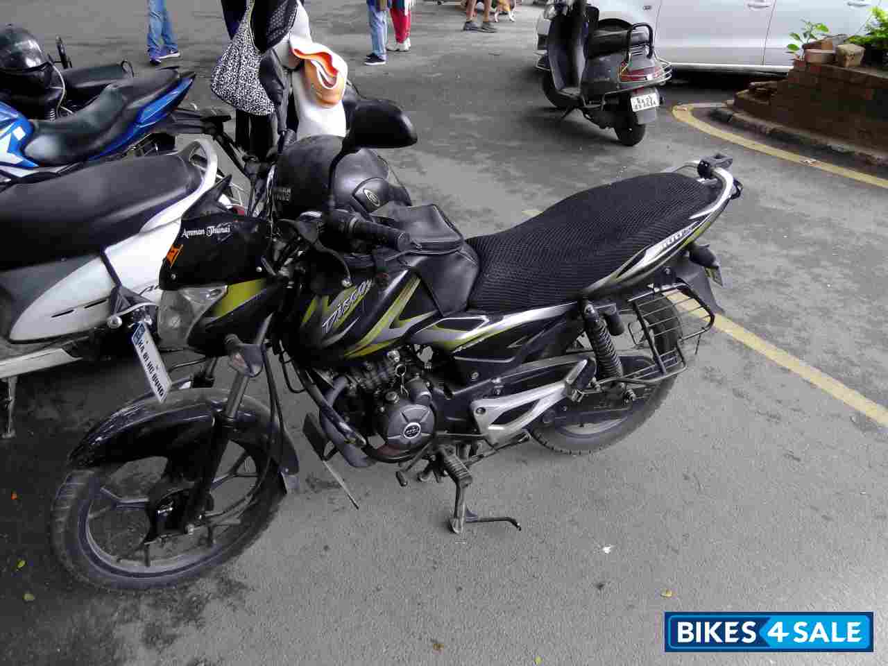 Green & Black Bajaj Discover 100M