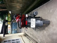 Red Bajaj Discover 150 S