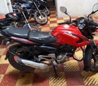 Red Bajaj Pulsar 135LS