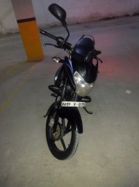 Black Bajaj XCD 135 DTS-Si