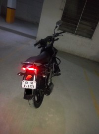 Black Bajaj XCD 135 DTS-Si