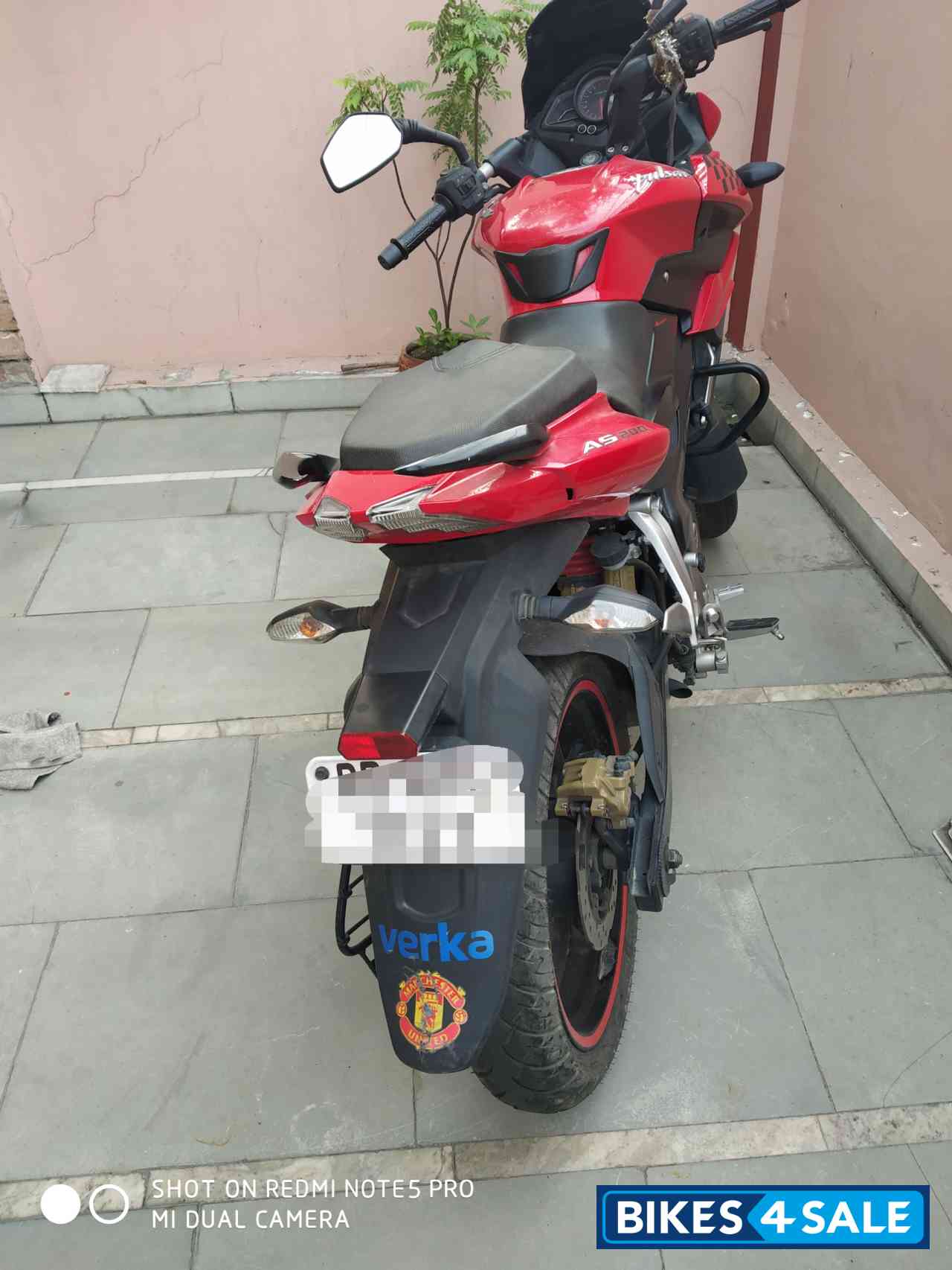Red Bajaj Pulsar AS 200
