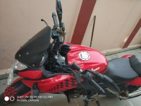 Red Bajaj Pulsar AS 200