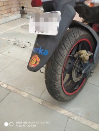 Red Bajaj Pulsar AS 200