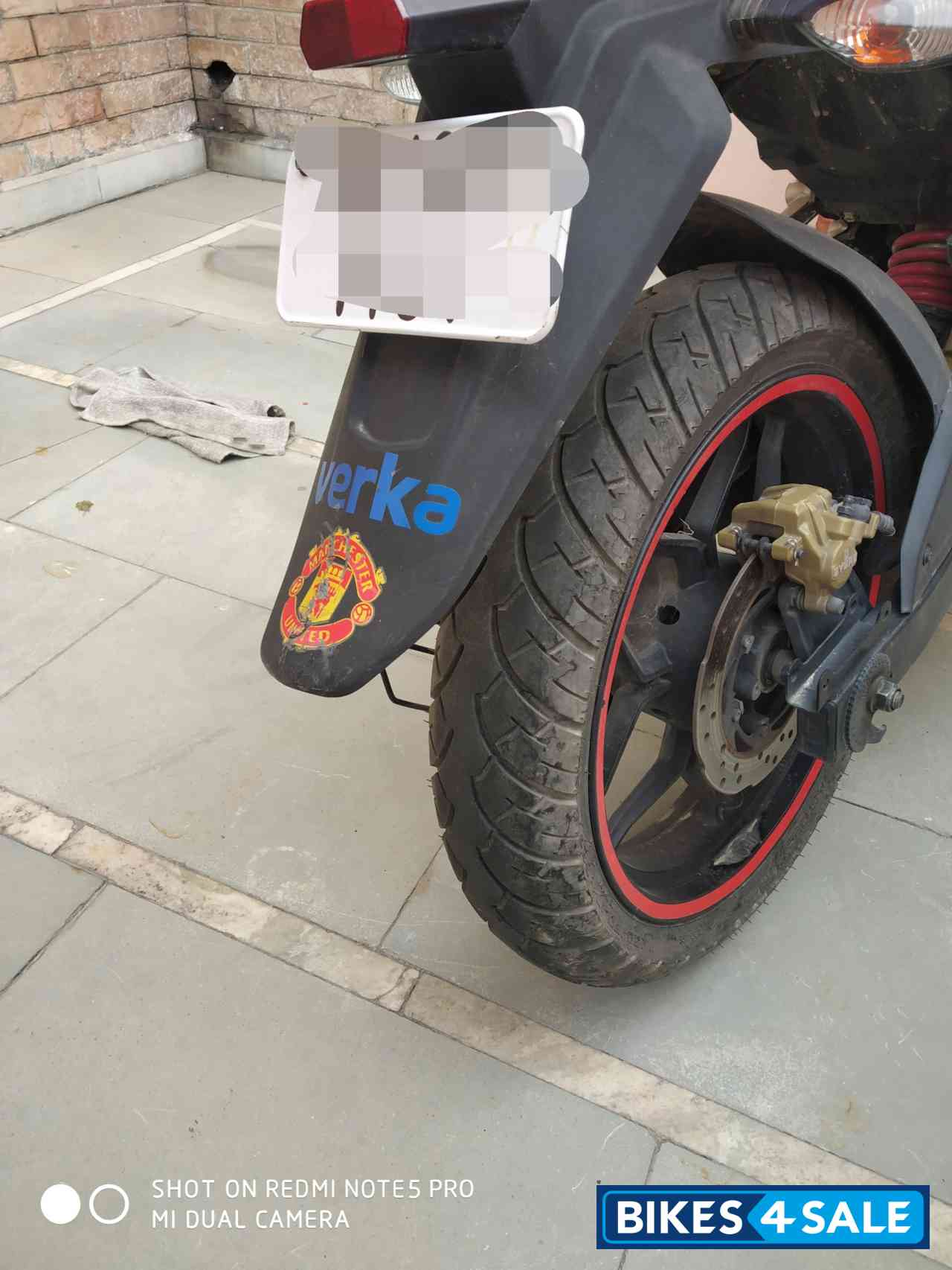 Red Bajaj Pulsar AS 200