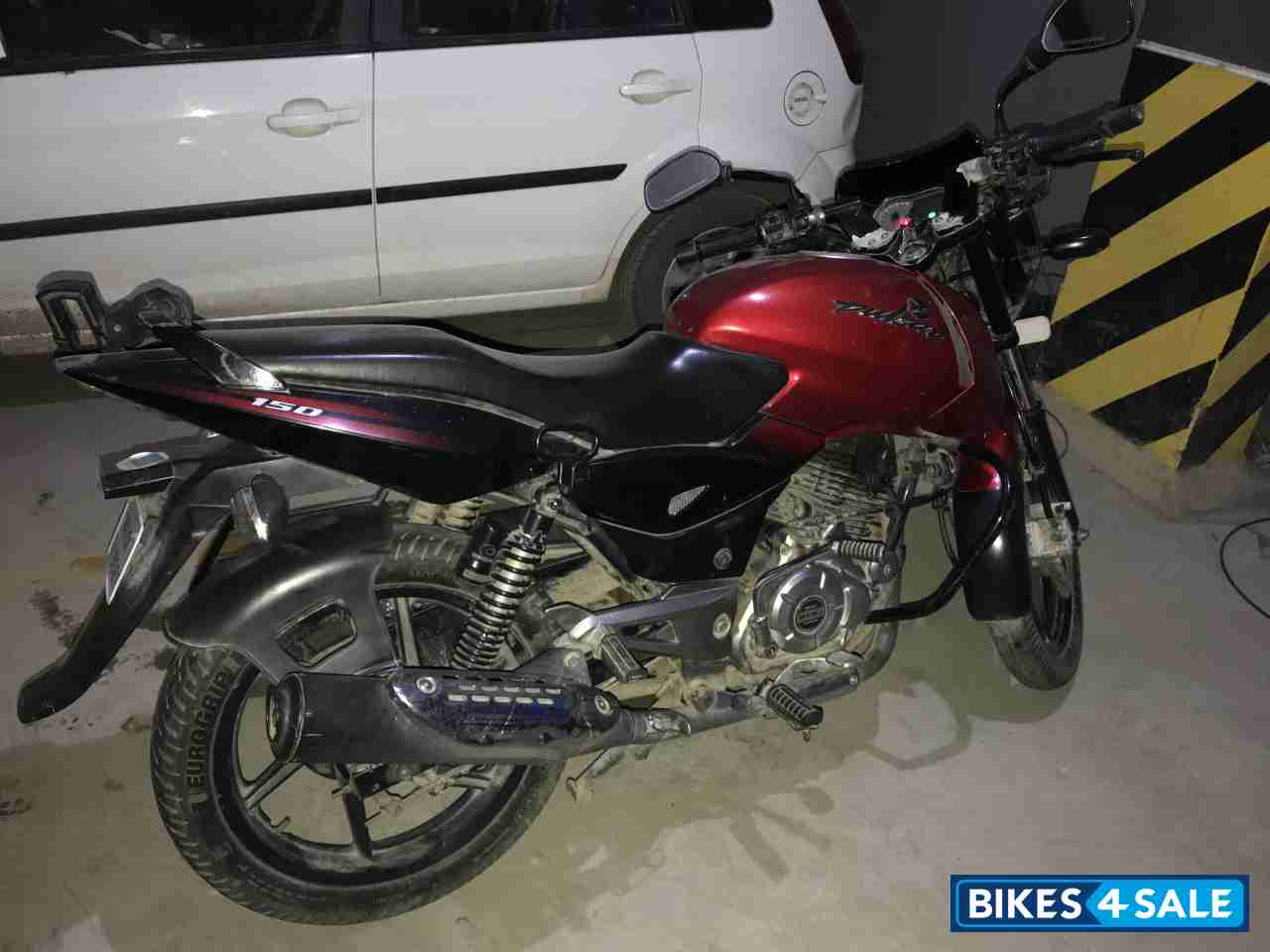 Red/black Bajaj Pulsar 150 DTSi