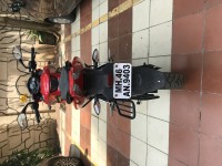 Red Bajaj Pulsar AS 150