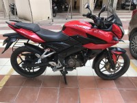 Red Bajaj Pulsar AS 150