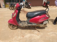 Red Suzuki Access 125