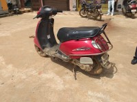 Red Suzuki Access 125