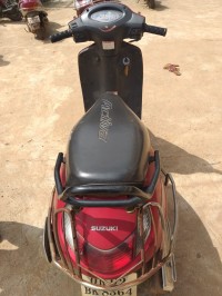 Red Suzuki Access 125